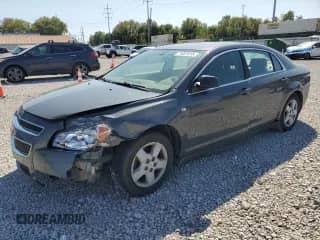 2008 Chevrolet Malibu 1LS with VIN 1G1ZG57B784187189, listed as a Copart auction lot 71061015 with 99,547 mi miles and Salvage title. Bid and sale history available at DreamBid. Image 1.