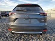 ✅ 2021 Mazda CX-9 Grand Touring • VIN: JM3TCADYXM0517720 • Лот: 92196945. Опубликован ранее на Copart с пробегом 77 213 миль. Бесплатный доступ к архиву аукционных продаж из США и подробный отчёт об истории автомобиля на DreamBid. Изображение 6.