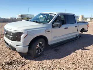 ✅ 2023 Ford F-150 Lightning Pro • VIN: 1FTVW1EL1PWG42537 • Лот: 86660095. Опубликован ранее на Copart с пробегом 17 407 миль. Бесплатный доступ к архиву аукционных продаж из США и подробный отчёт об истории автомобиля на DreamBid. Изображение 1.