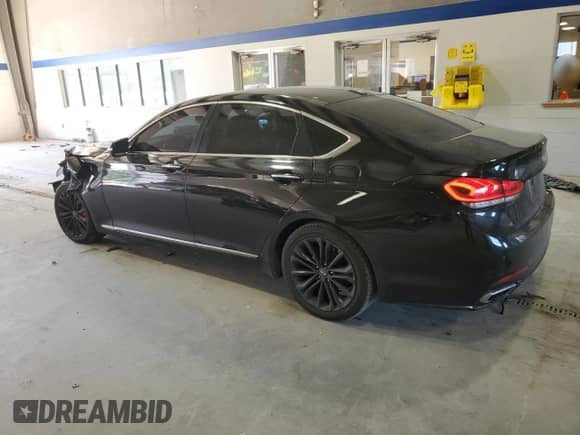 2016 Hyundai Genesis 3.8L z VIN KMHGN4JE9GU127474, wystawiony jako Copart lot #76671724 z przebiegiem 96 985 mil mil oraz Szkoda całkowita • Salvage title. Historia ofert i sprzedaży dostępna na DreamBid. Obrazek 2.