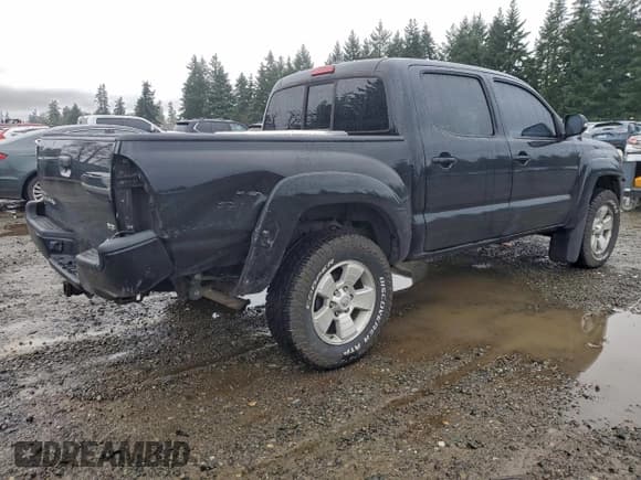 ✅ 2013 Toyota Tacoma • VIN: 3TMLU4EN8DM110116 • Lot: 94744585. Listed on Copart with 123,623 mi. Free auction sales archive from the USA and detailed vehicle history report at DreamBid. Image 3.