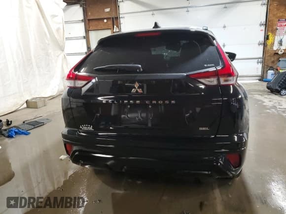 ✅ 2024 Mitsubishi Eclipse Cross SE • VIN: JA4ATWAA5RZ064902 • Лот: 56657385. Опубликован ранее на Copart с пробегом 7 972 миль. Бесплатный доступ к архиву аукционных продаж из США и подробный отчёт об истории автомобиля на DreamBid. Изображение 6.