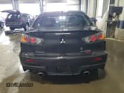 ✅ 2014 Mitsubishi Lancer Evolution MR • VIN: JA32W5FV7EU007274 • Лот: 70159245. Опубликован ранее на Copart с пробегом 72 155 миль. Бесплатный доступ к архиву аукционных продаж из США и подробный отчёт об истории автомобиля на DreamBid. Изображение 6.