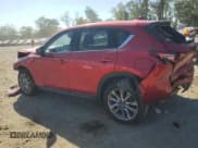 ✅ 2021 Mazda CX-5 Grand Touring • VIN: JM3KFBDM9M0391713 • Лот: 84789325. Опубликован ранее на Copart с пробегом 25 207 миль. Бесплатный доступ к архиву аукционных продаж из США и подробный отчёт об истории автомобиля на DreamBid. Изображение 2.