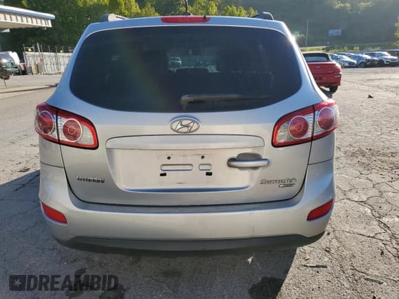 ✅ 2010 Hyundai Santa Fe GLS • VIN: 5NMSGDAB4AH346114 • Lot: 70397474. Listed on Copart with 177,510 mi. Free auction sales archive from the USA and detailed vehicle history report at DreamBid. Image 6.