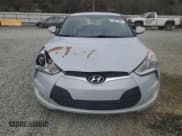 ✅ 2014 Hyundai Veloster • VIN: KMHTC6AD6EU213698 • Lot: 78961304. Wystawiony na Copart z przebiegiem 150 864 mil. Bezpłatny archiwum sprzedaży aukcyjnych z USA i szczegółowy raport historii pojazdu na DreamBid. Zdjęcie 5.