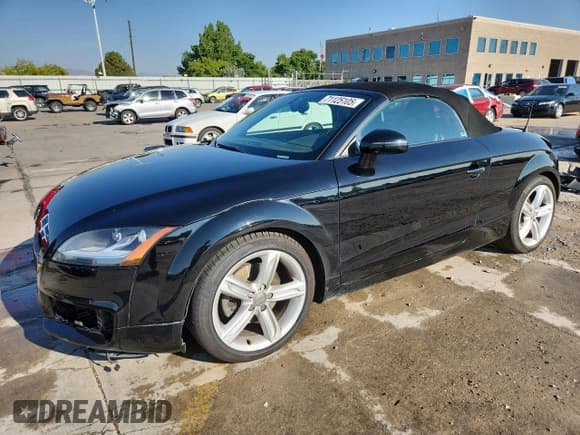 ✅ 2013 Audi TT • VIN: TRU4FAFKXD1010748 • Lot: 71125105. Listed on Copart with 99,928 mi. Free auction sales archive from the USA and detailed vehicle history report at DreamBid. Image 1.