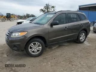 ✅ 2012 Hyundai Santa Fe GLS • VIN: 5XYZG4AG0CG153062 • Lot: 76452394. Listed on Copart with 99,354 mi. Free auction sales archive from the USA and detailed vehicle history report at DreamBid. Image 1.