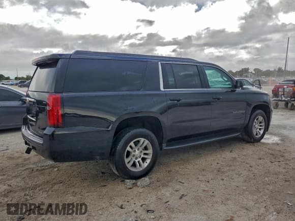✅ 2018 Chevrolet Suburban LS • VIN: 1GNSCGEC3JR315584 • Lot: 94428525. Listed on Copart with 96,373 mi. Free auction sales archive from the USA and detailed vehicle history report at DreamBid. Image 3.