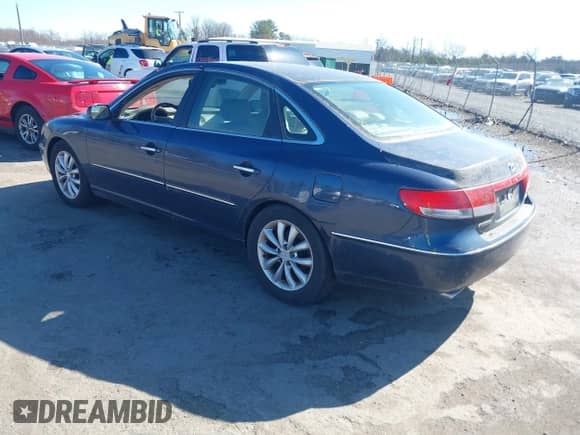 2006 Hyundai Azera SE z VIN KMHFC46F86A041396, wystawiony jako IAAI lot #41858709 z przebiegiem 216 101 mil mil oraz . Historia ofert i sprzedaży dostępna na DreamBid. Obrazek 3.