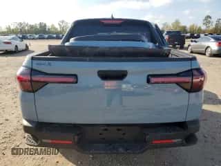 2025 Hyundai Santa Cruz SE с VIN 5NTJA4DE1SH131735, выставлен на аукционе Copart как лот 84246654 с пробегом 2 220 миль миль и Списание • Salvage title. История ставок и продаж доступна на DreamBid. Изображение 6.