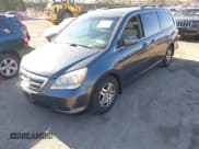 ✅ 2005 Honda Odyssey EX-L • VIN: 5FNRL38725B102748 • Lot: 43810716. Listed on IAAI with 211,348 mi. Free auction sales archive from the USA and detailed vehicle history report at DreamBid. Image 2.