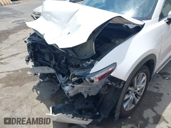 ✅ 2019 Mazda CX-9 Grand Touring • VIN: JM3TCADY3K0307375 • Lot: 42159412. Wystawiony na IAAI z przebiegiem 121 265 mil. Bezpłatny archiwum sprzedaży aukcyjnych z USA i szczegółowy raport historii pojazdu na DreamBid. Zdjęcie 6.