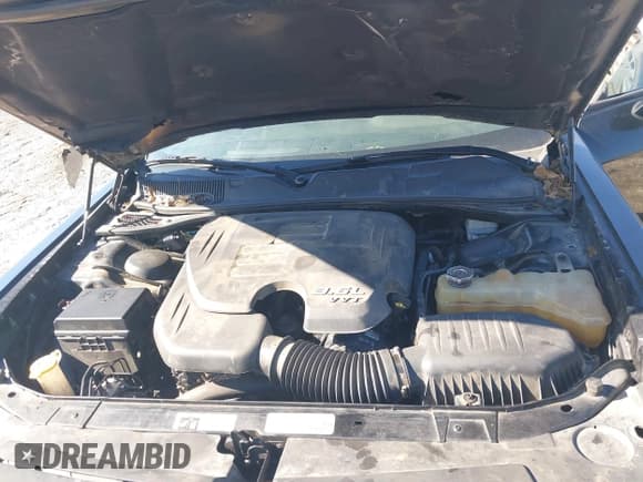 ✅ 2014 Dodge Challenger SXT • VIN: 2C3CDYAG1EH229824 • Lot: 41749410. Listed on IAAI with 103,079 mi. Free auction sales archive from the USA and detailed vehicle history report at DreamBid. Image 10.