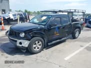 ✅ 2009 Nissan Frontier SE • VIN: 1N6AD09W69C409466 • Lot: 42757199. Listed on IAAI with 150,758 mi. Free auction sales archive from the USA and detailed vehicle history report at DreamBid. Image 2.