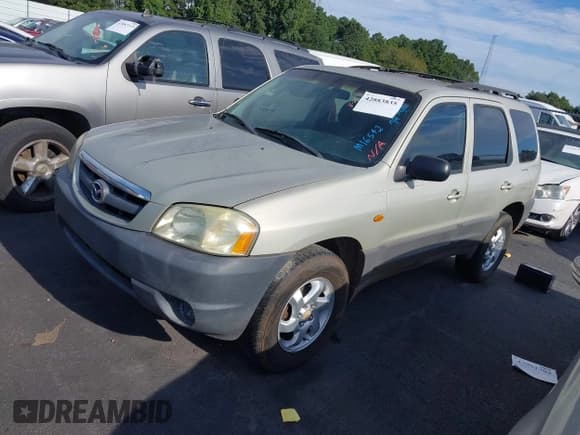 ✅ 2004 Mazda Tribute DX • VIN: 4F2YZ02B84KM16542 • Лот: 42883835. Опубликован ранее на IAAI с пробегом 304 569 миль. Бесплатный доступ к архиву аукционных продаж из США и подробный отчёт об истории автомобиля на DreamBid. Изображение 2.