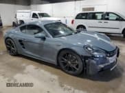 ✅ 2017 Porsche 718 Cayman • VIN: WP0AA2A86HS270870 • Lot: 62981095. Wystawiony na Copart z przebiegiem 59 118 mil. Bezpłatny archiwum sprzedaży aukcyjnych z USA i szczegółowy raport historii pojazdu na DreamBid. Zdjęcie 4.