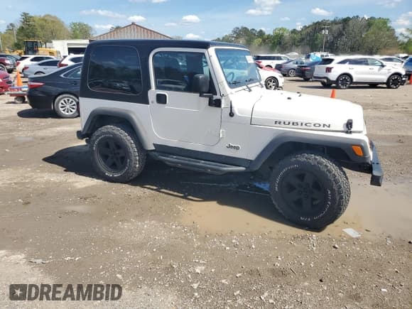 ✅ 2003 Jeep Wrangler Rubicon • VIN: 1J4FA69S73P333199 • Lot: 50602615. Listed on Copart with 133,254 mi. Free auction sales archive from the USA and detailed vehicle history report at DreamBid. Image 4.