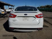 ✅ 2014 Ford Fusion Titanium • VIN: 3FA6P0D92ER260542 • Лот: 86135065. Опубликован ранее на Copart с пробегом 160 664 миль. Бесплатный доступ к архиву аукционных продаж из США и подробный отчёт об истории автомобиля на DreamBid. Изображение 6.