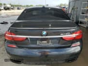 ✅ 2018 BMW 7 Series 750i • VIN: WBA7F0C56JGM22820 • Лот: 84008985. Опубликован ранее на Copart с пробегом 82 715 миль. Бесплатный доступ к архиву аукционных продаж из США и подробный отчёт об истории автомобиля на DreamBid. Изображение 6.