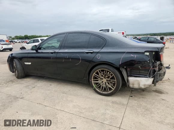 ✅ 2015 BMW 7 Series 750i • VIN: WBAYA8C54FG197788 • Lot: 63431285. Listed on Copart with 114,581 mi. Free auction sales archive from the USA and detailed vehicle history report at DreamBid. Image 2.