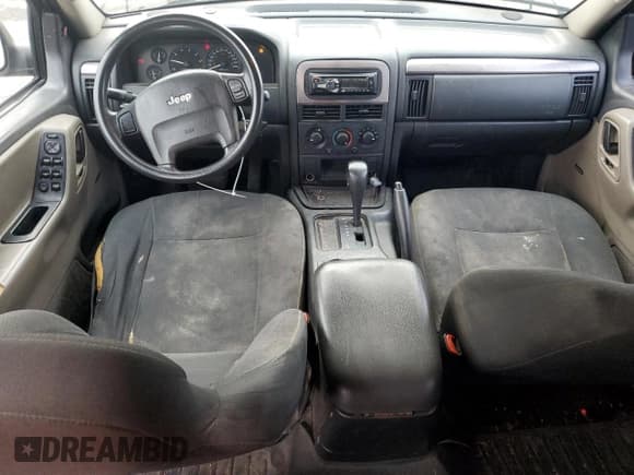 ✅ 2003 Jeep Grand Cherokee Laredo • VIN: 1J4GX48S73C518854 • Лот: 92987425. Опубликован ранее на Copart с пробегом 332 375 миль. Бесплатный доступ к архиву аукционных продаж из США и подробный отчёт об истории автомобиля на DreamBid. Изображение 8.