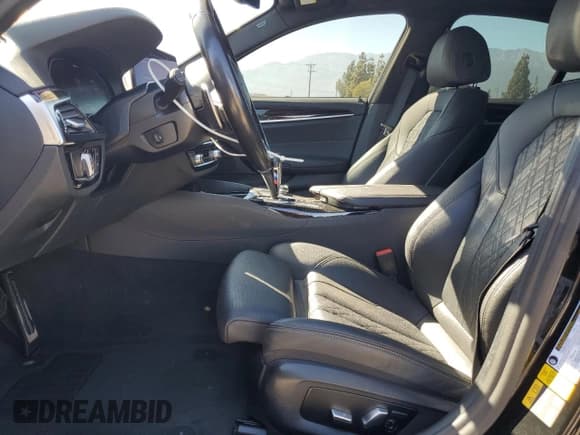 ✅ 2021 BMW 5 Series 530e • VIN: WBA13AG03MCF30961 • Lot: 64296025. Listed on Copart with 46,739 mi. Free auction sales archive from the USA and detailed vehicle history report at DreamBid. Image 7.