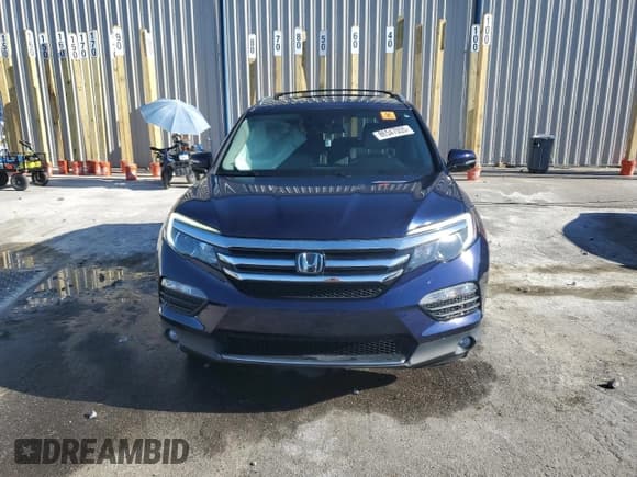 ✅ 2018 Honda Pilot Elite • VIN: 5FNYF6H05JB023270 • Lot: 86547055. Wystawiony na Copart z przebiegiem 73 044 mil. Bezpłatny archiwum sprzedaży aukcyjnych z USA i szczegółowy raport historii pojazdu na DreamBid. Zdjęcie 5.