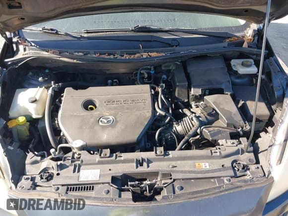 ✅ 2012 Mazda 5 Sport • VIN: JM1CW2BL7C0102981 • Лот: 43726585. Опубликован ранее на IAAI с пробегом 76 920 миль. Бесплатный доступ к архиву аукционных продаж из США и подробный отчёт об истории автомобиля на DreamBid. Изображение 10.