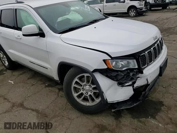 ✅ 2018 Jeep Grand Cherokee Laredo E • VIN: 1C4RJFAG4JC457350 • Lot: 82081045. Listed on Copart with 113,471 mi. Free auction sales archive from the USA and detailed vehicle history report at DreamBid. Image 14.