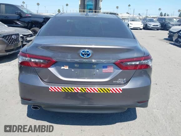 2022 Toyota Camry Hybrid XLE with VIN 4T1F31AK4NU571560, listed as a IAAI auction lot 42654973 with 10,810 mi miles and . Bid and sale history available at DreamBid. Image 16.