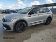 ✅ 2023 Volkswagen Tiguan SE R-Line Black • VIN: 3VVCB7AX4PM054406 • Лот: 89832915. Опубликован ранее на Copart с пробегом Не указан. Бесплатный доступ к архиву аукционных продаж из США и подробный отчёт об истории автомобиля на DreamBid. Изображение 1.