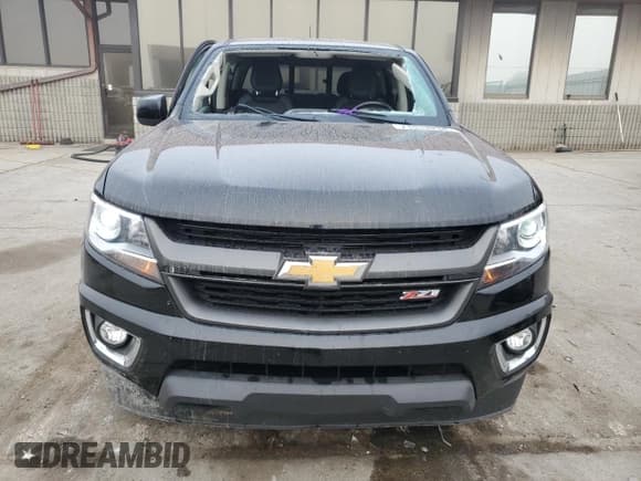 ✅ 2019 Chevrolet Colorado 4WD Z71 • VIN: 1GCGTDEN5K1329341 • Лот: 71913234. Опубликован ранее на Copart с пробегом 56 159 миль. Бесплатный доступ к архиву аукционных продаж из США и подробный отчёт об истории автомобиля на DreamBid. Изображение 5.