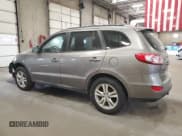 ✅ 2012 Hyundai Santa Fe SE • VIN: 5XYZH4AG2CG108198 • Lot: 76877024. Listed on Copart with 190,609 mi. Free auction sales archive from the USA and detailed vehicle history report at DreamBid. Image 2.