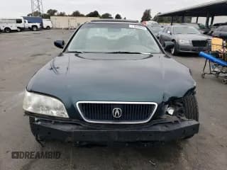 ✅ 1997 Acura TL • VIN: JH4UA364XVC009481 • Лот: 71063854. Опубликован ранее на Copart с пробегом 195 765 миль. Бесплатный доступ к архиву аукционных продаж из США и подробный отчёт об истории автомобиля на DreamBid. Изображение 5.