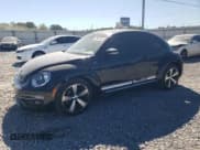 ✅ 2014 Volkswagen Beetle Turbo R-Line • VIN: 3VWVT7AT9EM636111 • Lot: 76061634. Listed on Copart with 94,021 mi. Free auction sales archive from the USA and detailed vehicle history report at DreamBid. Image 1.