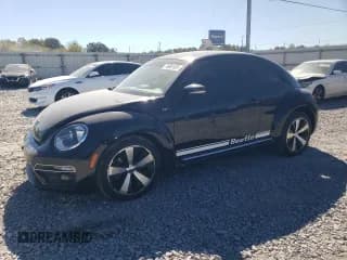 ✅ 2014 Volkswagen Beetle Turbo R-Line • VIN: 3VWVT7AT9EM636111 • Lot: 76061634. Listed on Copart with 94,021 mi. Free auction sales archive from the USA and detailed vehicle history report at DreamBid. Image 1.