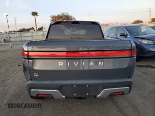 ✅ 2022 Rivian R1T Launch Edition • VIN: 7FCTGAAL4NN003060 • Lot: 82446374. Listed on Copart with 24,532 mi. Free auction sales archive from the USA and detailed vehicle history report at DreamBid. Image 6.