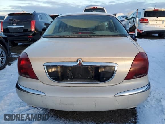 ✅ 2000 Lincoln Continental • VIN: 1LNHM97V6YY900603 • Lot: 85570864. Listed on Copart with 127,668 mi. Free auction sales archive from the USA and detailed vehicle history report at DreamBid. Image 6.