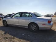 ✅ 2003 Jaguar S-Type • VIN: SAJEA01T33FM59487 • Лот: 80666965. Опубликован ранее на Copart с пробегом 59 700 миль. Бесплатный доступ к архиву аукционных продаж из США и подробный отчёт об истории автомобиля на DreamBid. Изображение 2.