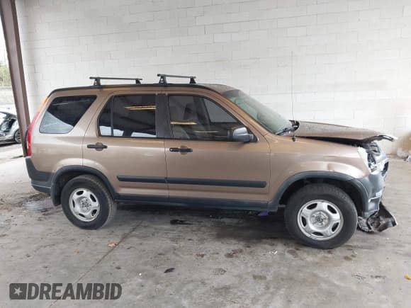 ✅ 2004 Honda CR-V LX • VIN: JHLRD78414C059335 • Lot: 43621422. Wystawiony na IAAI z przebiegiem 265 466 mil. Bezpłatny archiwum sprzedaży aukcyjnych z USA i szczegółowy raport historii pojazdu na DreamBid. Zdjęcie 13.