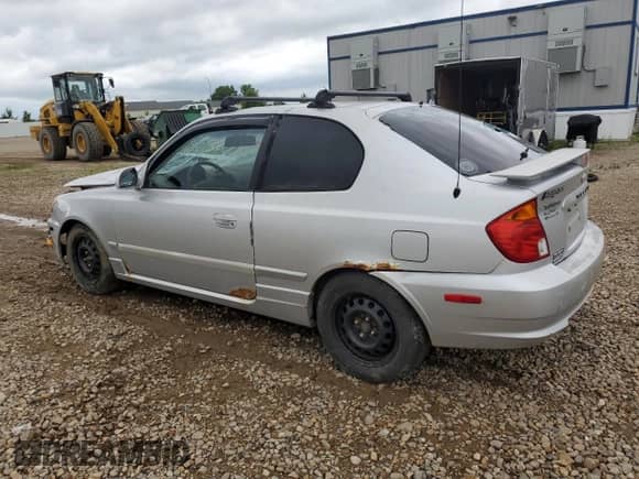 2004 Hyundai Accent GL с VIN KMHCG35C84U284632, выставлен на аукционе Copart как лот 67440585 с пробегом Не указан миль и Чистый • Clean title. История ставок и продаж доступна на DreamBid. Изображение 2.