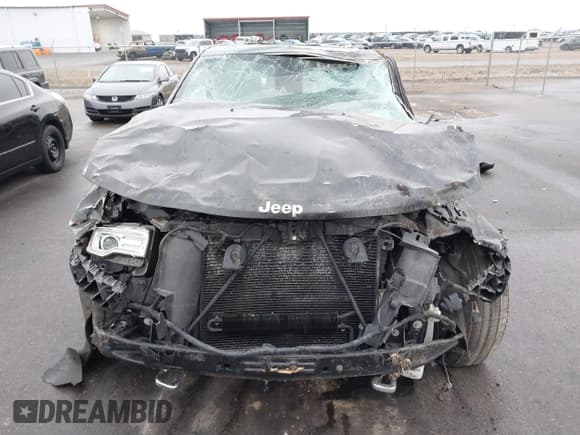 ✅ 2015 Jeep Grand Cherokee Overland • VIN: 1C4RJFCG3FC665854 • Lot: 41697999. Listed on IAAI with 206,618 mi. Free auction sales archive from the USA and detailed vehicle history report at DreamBid. Image 12.