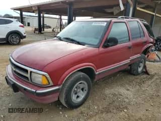 1997 Chevrolet Blazer LS with VIN 1GNCS13W2V2241199, listed as a Copart auction lot 86658264 with 314,227 mi miles and Salvage title. Bid and sale history available at DreamBid. Image 1.