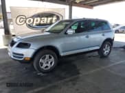 ✅ 2004 Volkswagen Touareg • VIN: WVGBC67L54D021262 • Lot: 64687405. Listed on Copart with 105,498 mi. Free auction sales archive from the USA and detailed vehicle history report at DreamBid. Image 1.