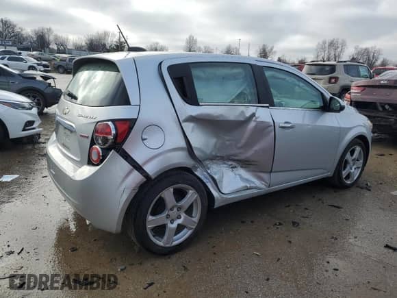 2015 Chevrolet Sonic LTZ с VIN 1G1JE6SBXF4187779, выставлен на аукционе Copart как лот 39363174 с пробегом 74 302 миль миль и Чистый • Clean title. История ставок и продаж доступна на DreamBid. Изображение 3.