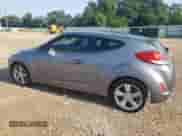 2015 Hyundai Veloster z VIN KMHTC6AD6FU227456, wystawiony jako Copart lot #66915114 z przebiegiem 83 266 mil mil oraz Szkoda całkowita • Salvage title. Historia ofert i sprzedaży dostępna na DreamBid. Obrazek 2.