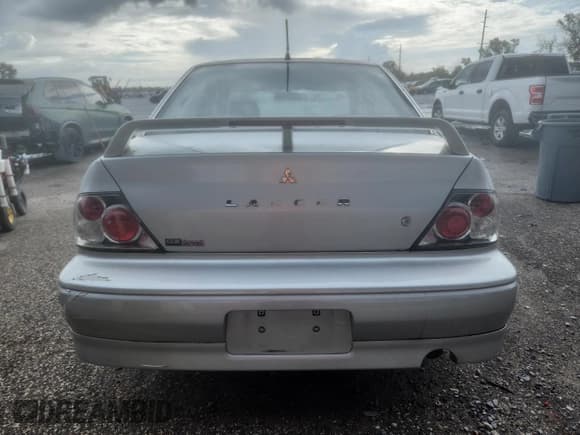 ✅ 2003 Mitsubishi Lancer OZ-Rally • VIN: JA3AJ86E93U109636 • Lot: 70269295. Listed on Copart with 186,742 mi. Free auction sales archive from the USA and detailed vehicle history report at DreamBid. Image 6.