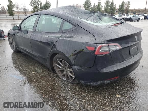 ✅ 2023 Tesla Model 3 • VIN: 5YJ3E1EA2PF671865 • Лот: 45220285. Опубликован ранее на Copart с пробегом 29 614 миль. Бесплатный доступ к архиву аукционных продаж из США и подробный отчёт об истории автомобиля на DreamBid. Изображение 2.