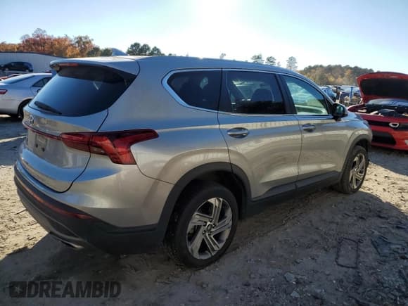✅ 2021 Hyundai Santa Fe SE • VIN: 5NMS14AJXMH330318 • Lot: 91399745. Listed on Copart with 139,874 mi. Free auction sales archive from the USA and detailed vehicle history report at DreamBid. Image 3.